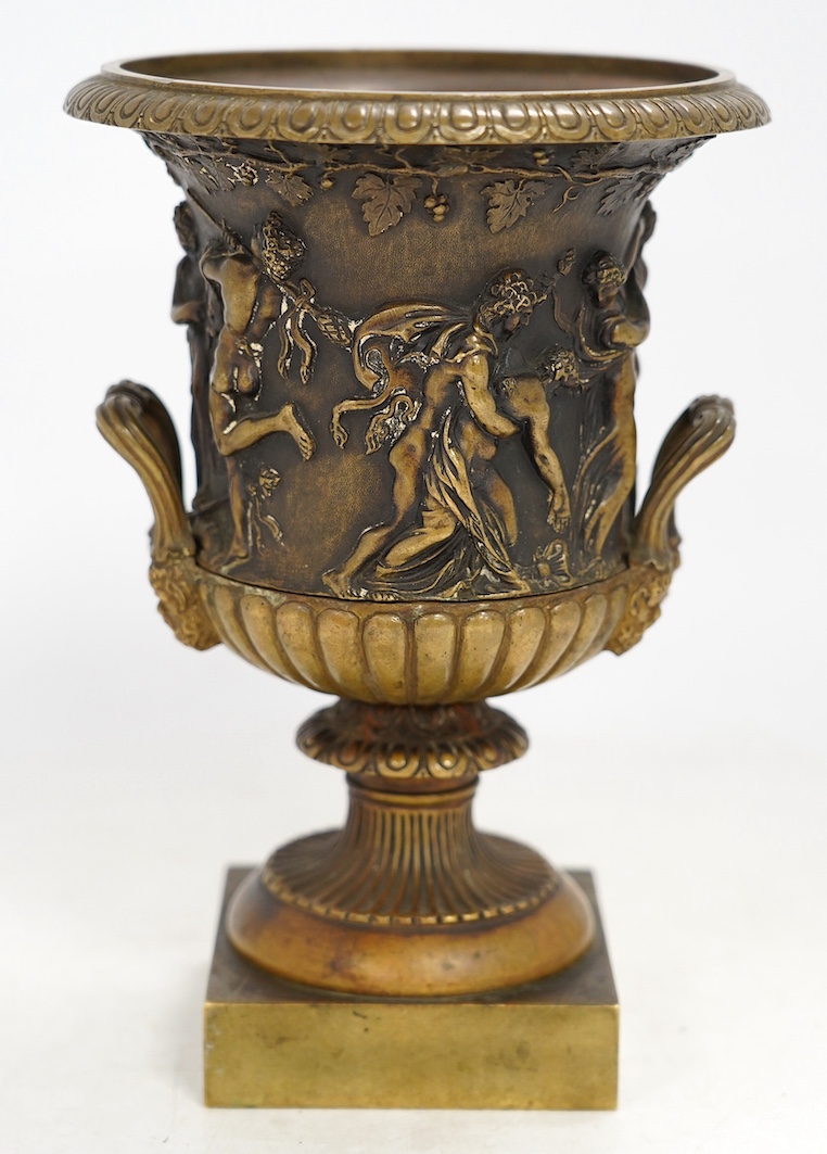 A mid 19th century bronze campana urn with classical figures, 22cm high. Condition - good